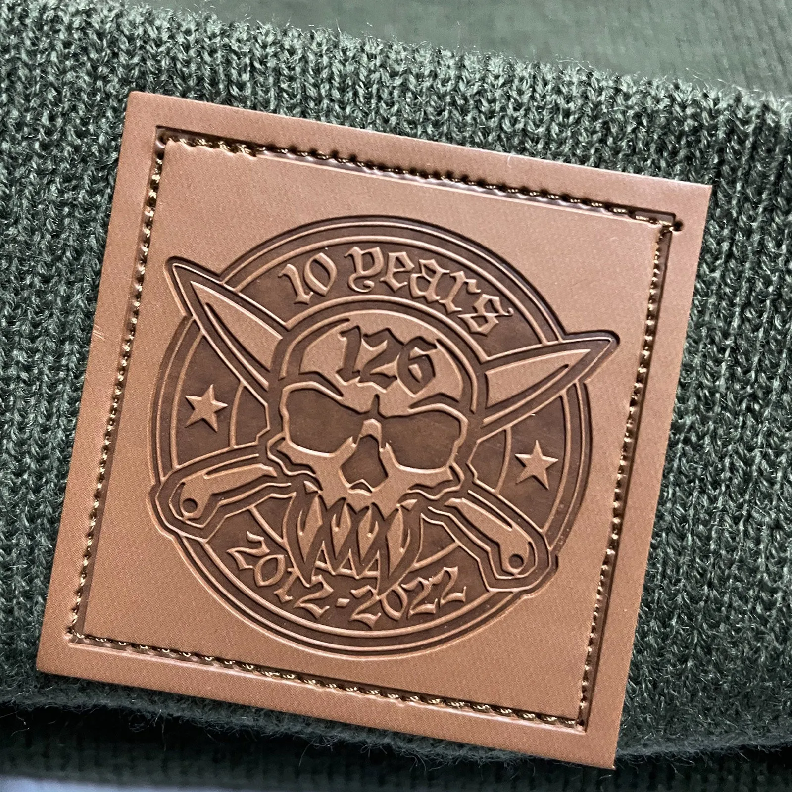 10 Year Anniversary Eco Leather Patch Beanie  (Olive Green)